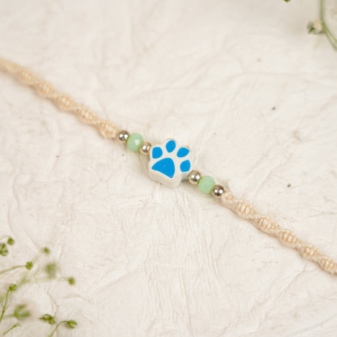 Handmade Paw Kids Rakhi With Roli Chawal - Front View Pink Paw Charm