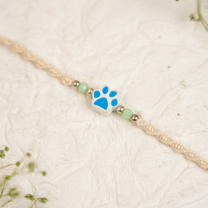 Handmade Paw Kids Rakhi With Roli Chawal - Front View Pink Paw Charm
