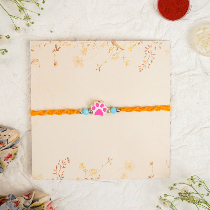 Handmade Paw Kids Rakhi With Roli Chawal - Front View Pink Paw Charm (19)