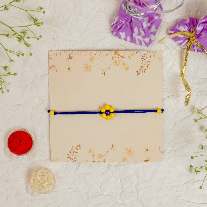 Handmade Beaded Flower Rakhi With Roli Chawal - Close-up of single bracelet (15)