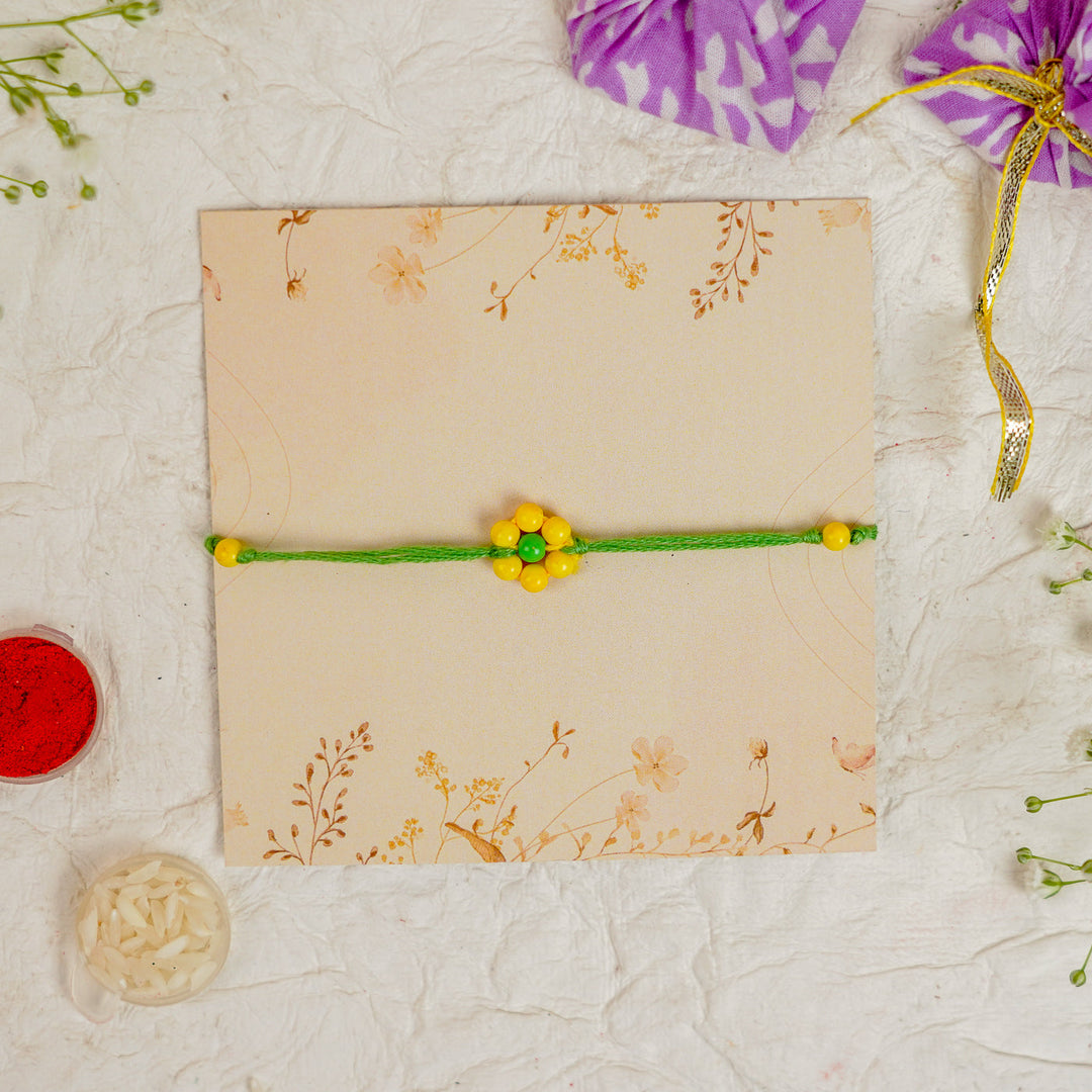 Handmade Beaded Flower Rakhi With Roli Chawal - Close-up of single bracelet (17)