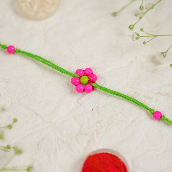 Handmade Beaded Flower Rakhi With Roli Chawal - Close-up of single bracelet (9)