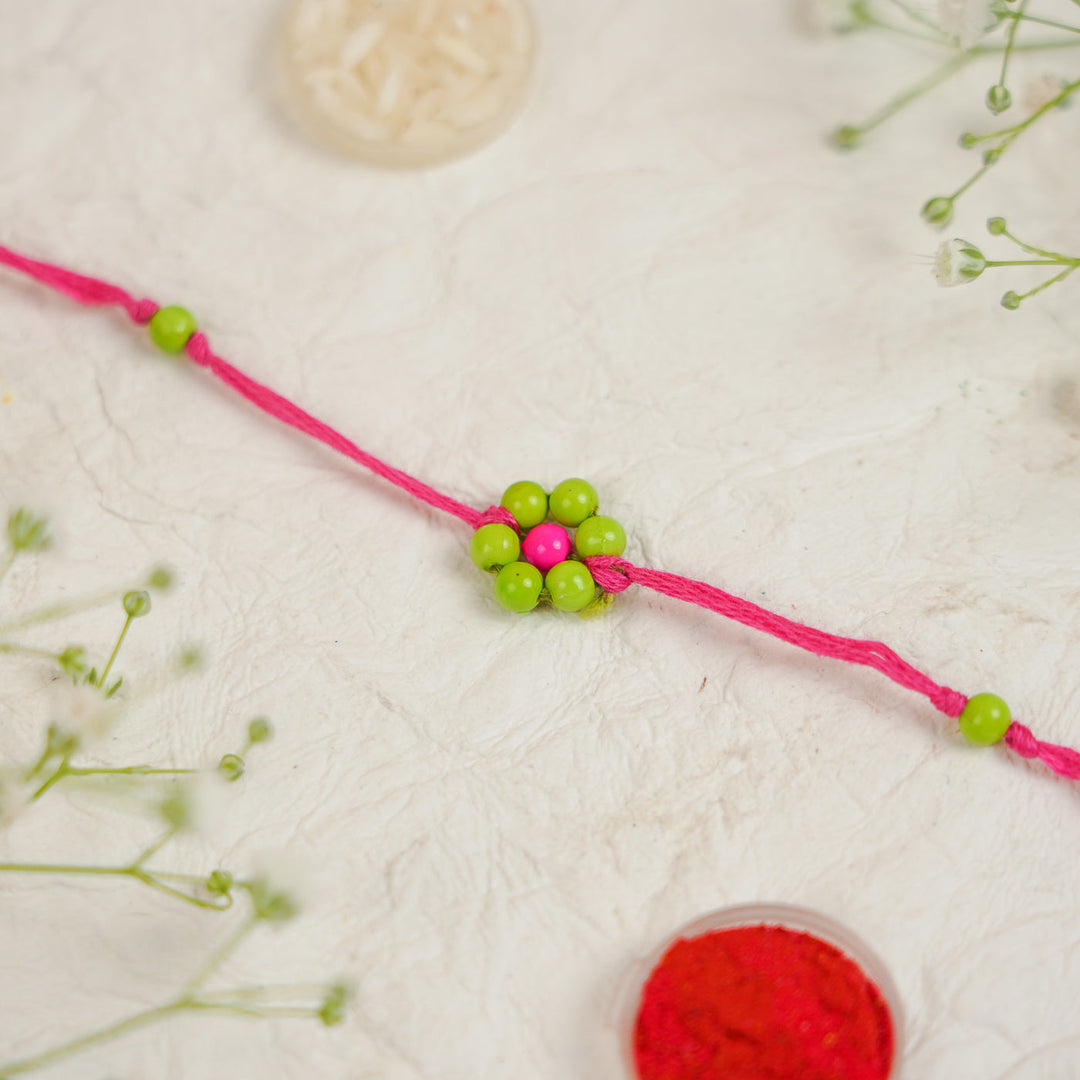 Handmade Beaded Flower Rakhi With Roli Chawal - Close-up of single bracelet (5)