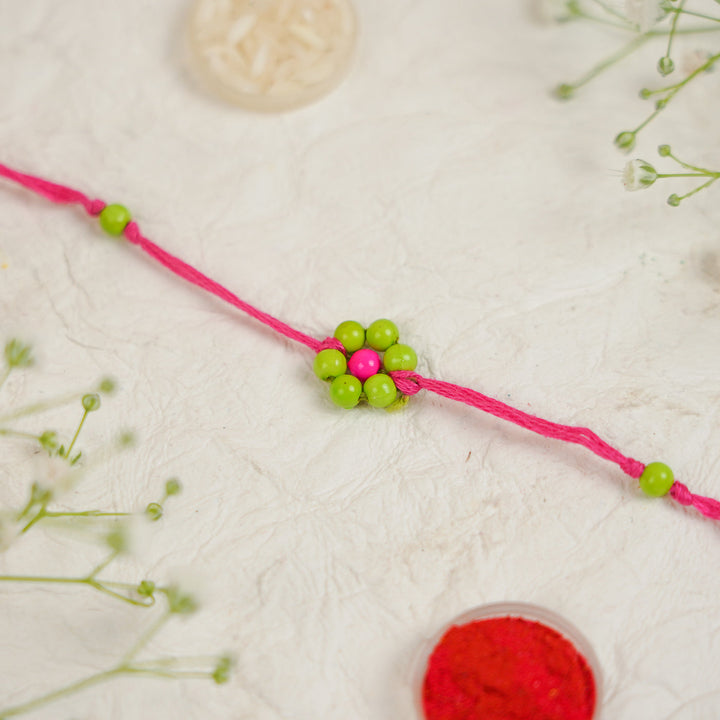 Handmade Beaded Flower Rakhi With Roli Chawal - Close-up of single bracelet (5)