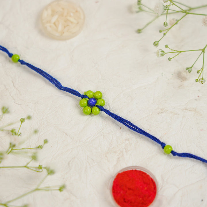 Handmade Beaded Flower Rakhi With Roli Chawal - Close-up of single bracelet (13)