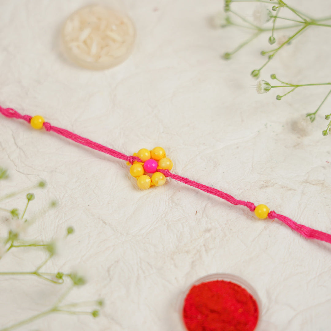 Handmade Beaded Flower Rakhi With Roli Chawal - Close-up of single bracelet (7)