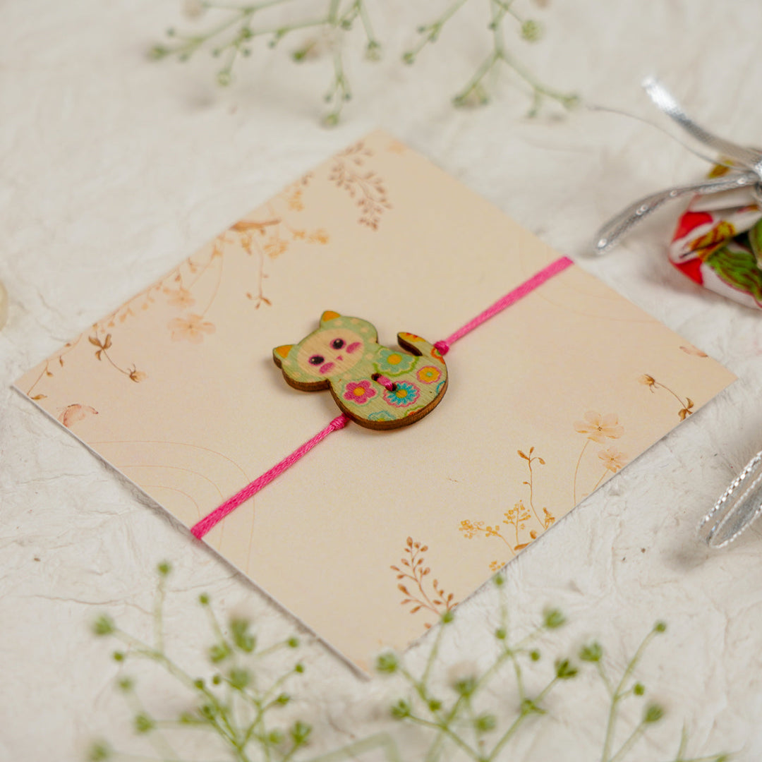 Handmade Cat Kids Rakhi With Roli Chawal 2 - Angled Side View with Light Cat Charm