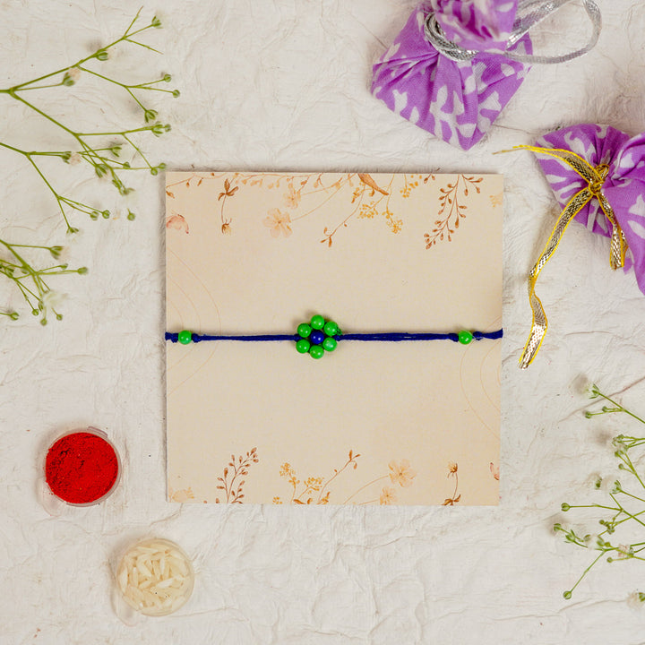 Handmade Beaded Flower Rakhi With Roli Chawal - Close-up of single bracelet (21)
