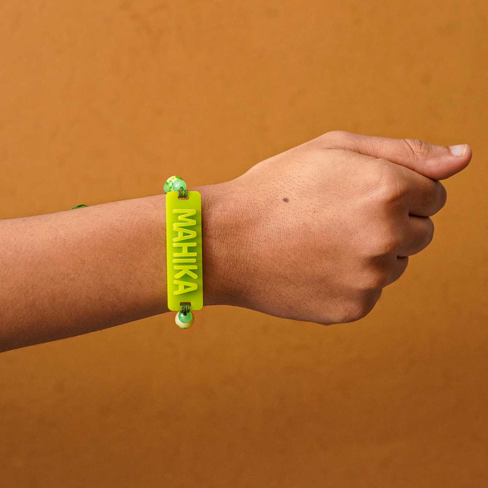 Personalized Handmade Neon Name Acrylic Rakhi With Roli Chawal - Worn on wrist