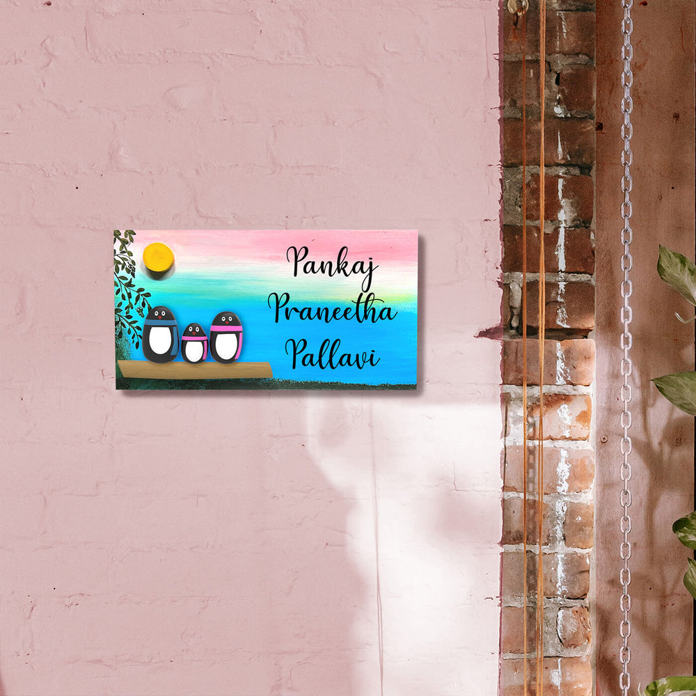 Hand Painted Pebble Art Name Plate For Family Of 3 3 - Mounted on Pink Brick Wall