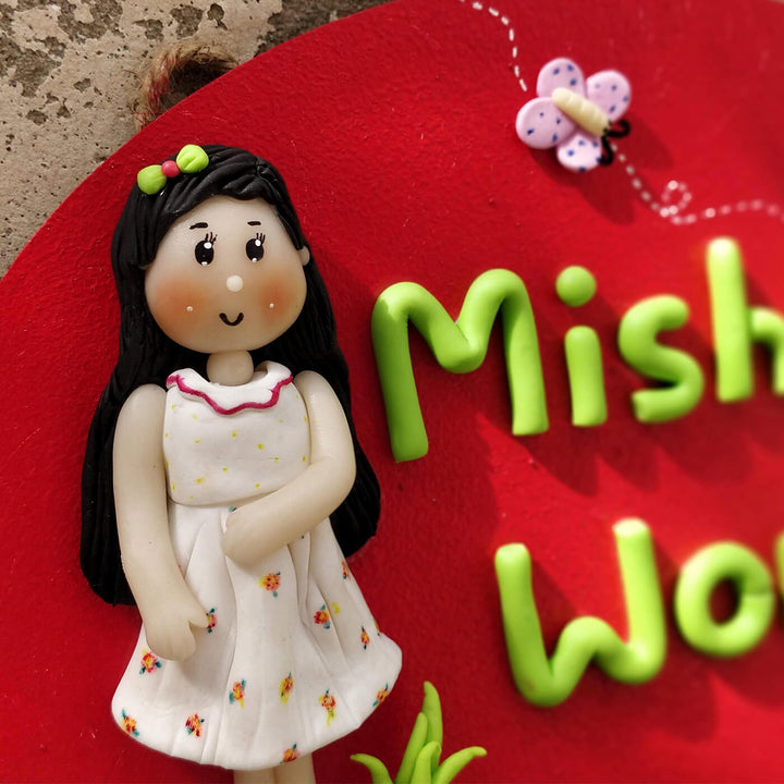 Handcrafted Personalized Clay Caricature Name Plate For Girls - Close-up on Figurine Detail