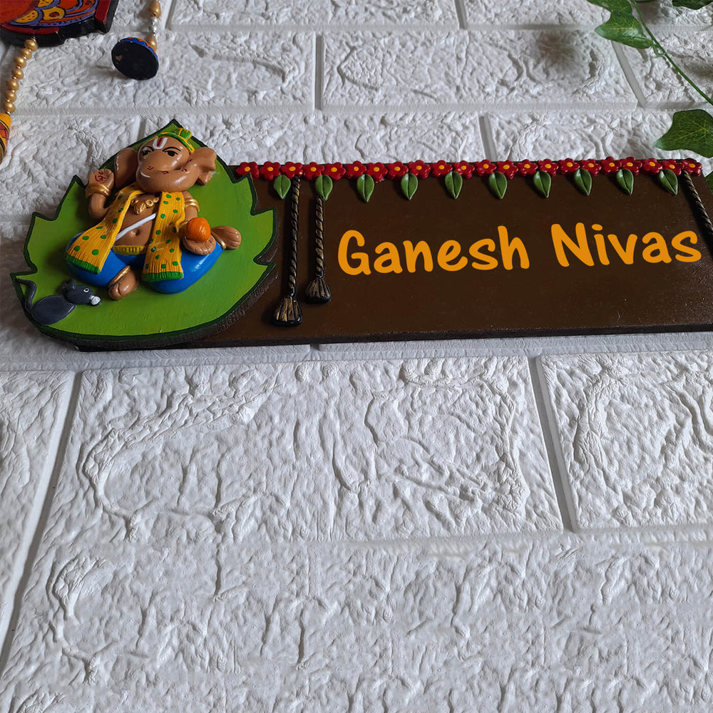 Handcrafted Personalised Ganesh Themed Name Plate 2 - Mounted on Textured Wall Close-up