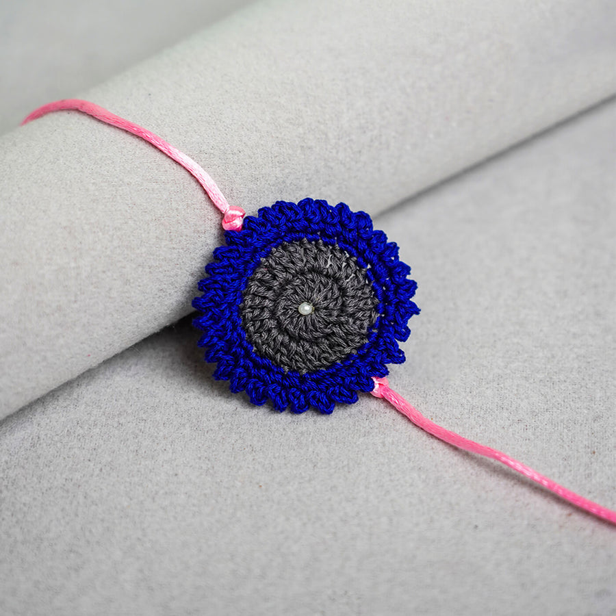 Handcrafted Mandala Crochet Rakhi With Roli Chawal For Kids 3 - Close-up Front View