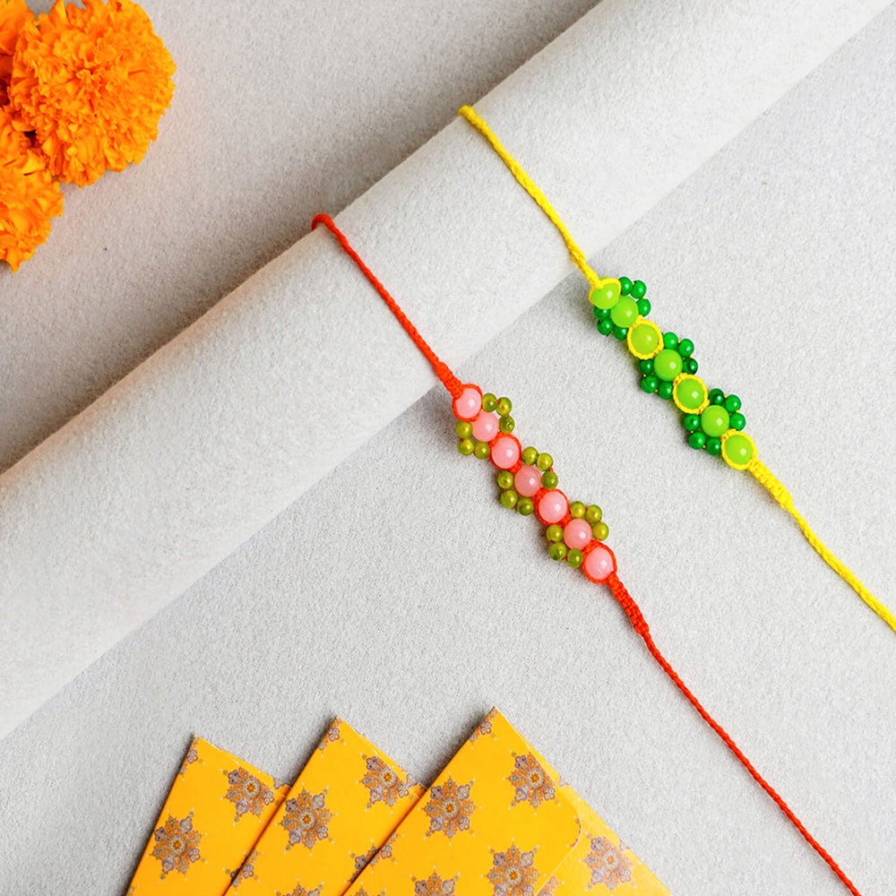 Handcrafted Macrame Floral Rakhi With Beads 2 - Top View Showing Two Rakhis