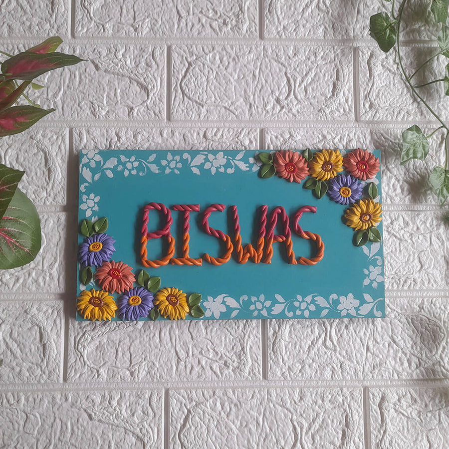 Handcrafted Personalised Floral Themed Name Plate 1 - Mounted on White Textured Wall