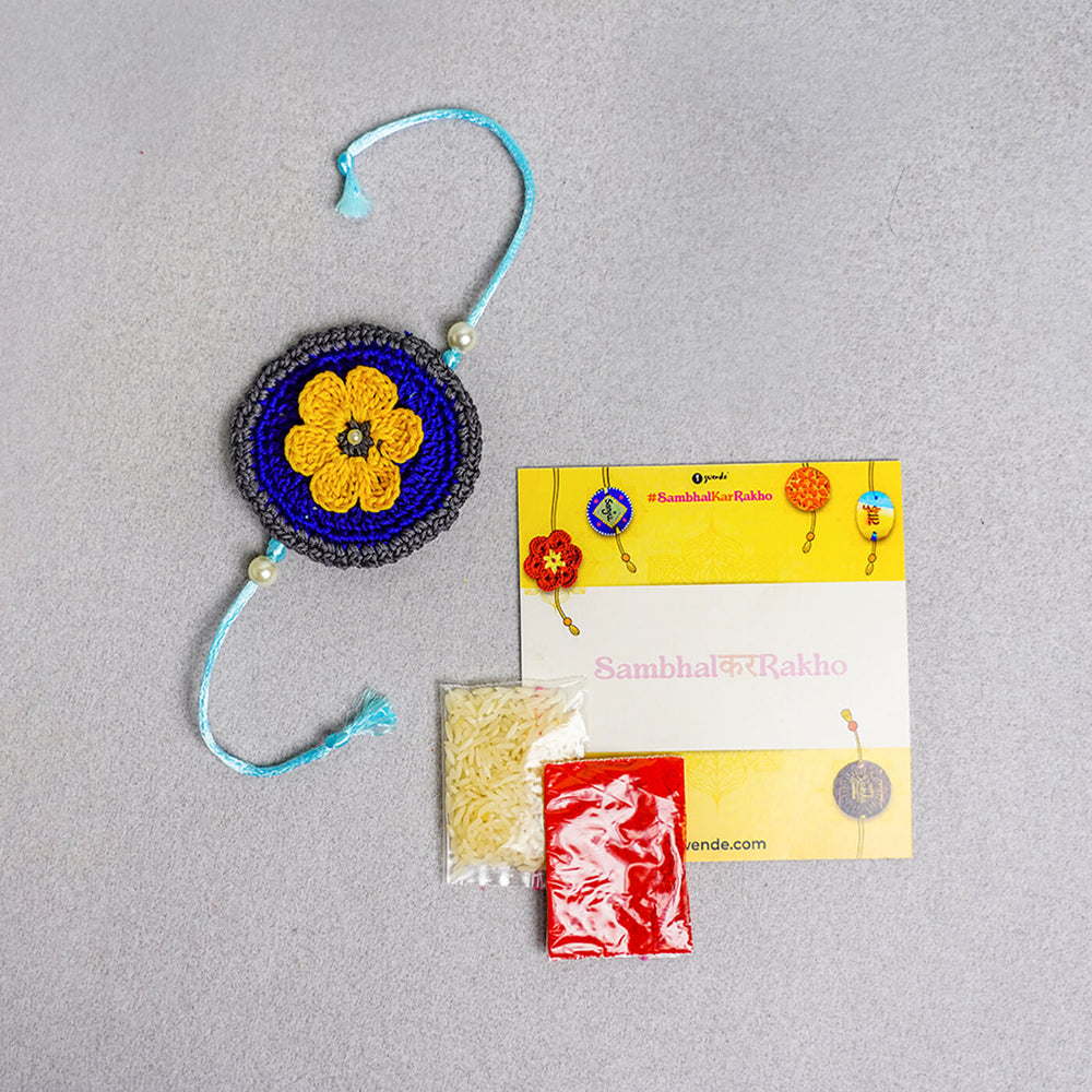 Floral Handcrafted Crochet Rakhi With Roli Chawal For Kids - Packaging Contents Display
