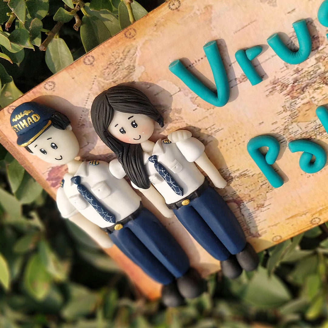 Handcrafted Personalized Clay Caricature Name Plate For Pilot Couples - Close-up of Personalized Figurines