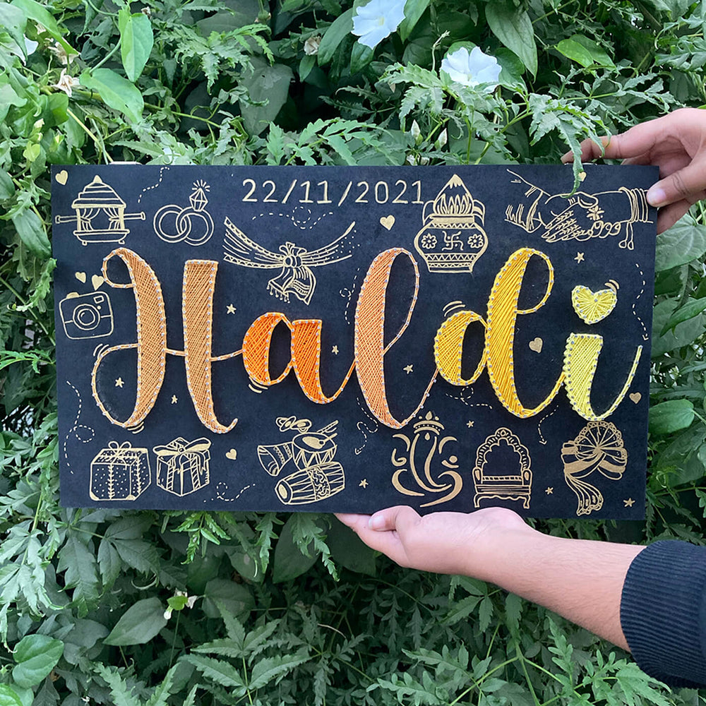 Haldi Theme String Art Name Plate - Held Front View with Hands