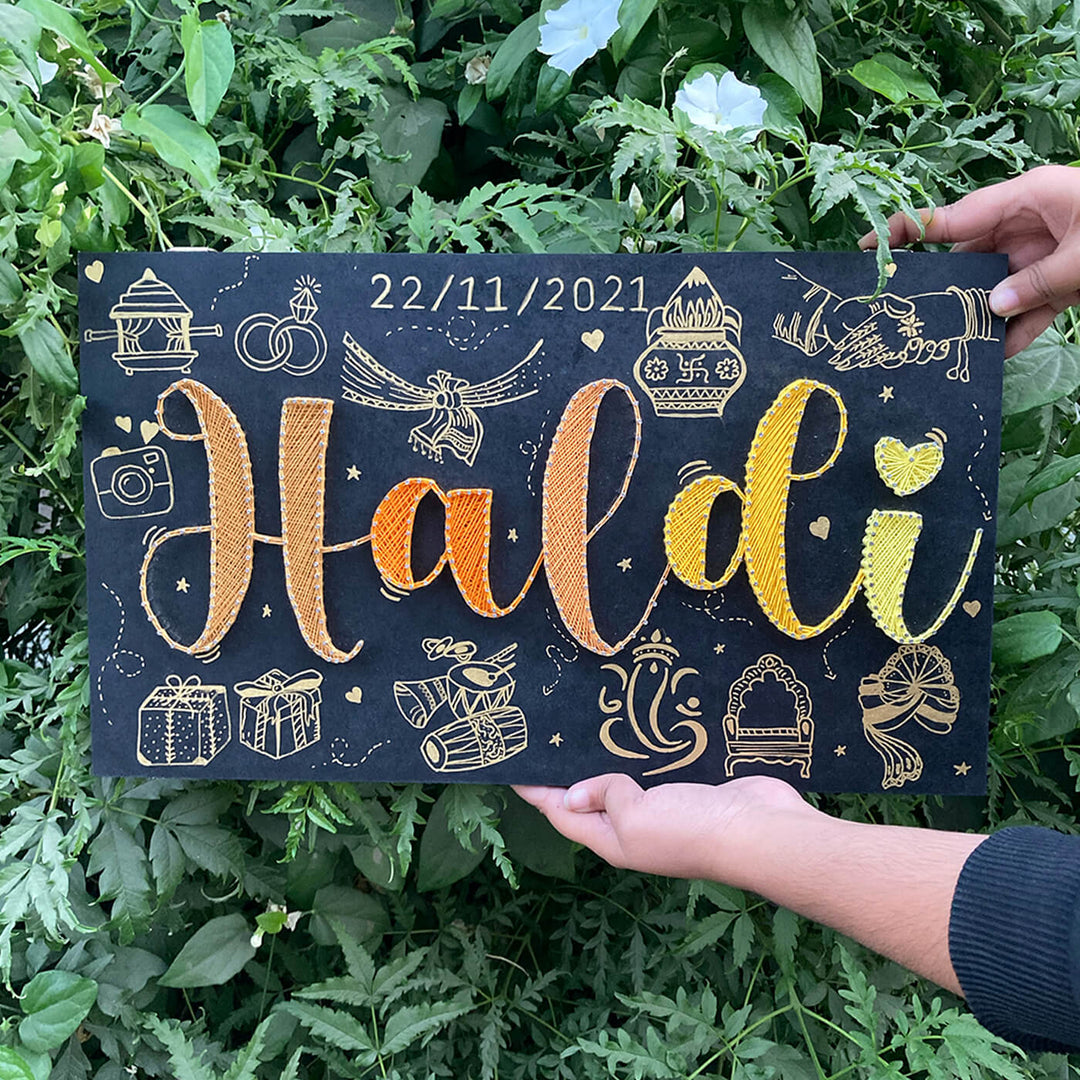 Haldi Theme String Art Name Plate - Held Front View with Hands