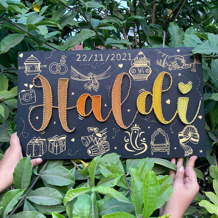 Haldi Theme String Art Name Plate - Front View Held by Hands