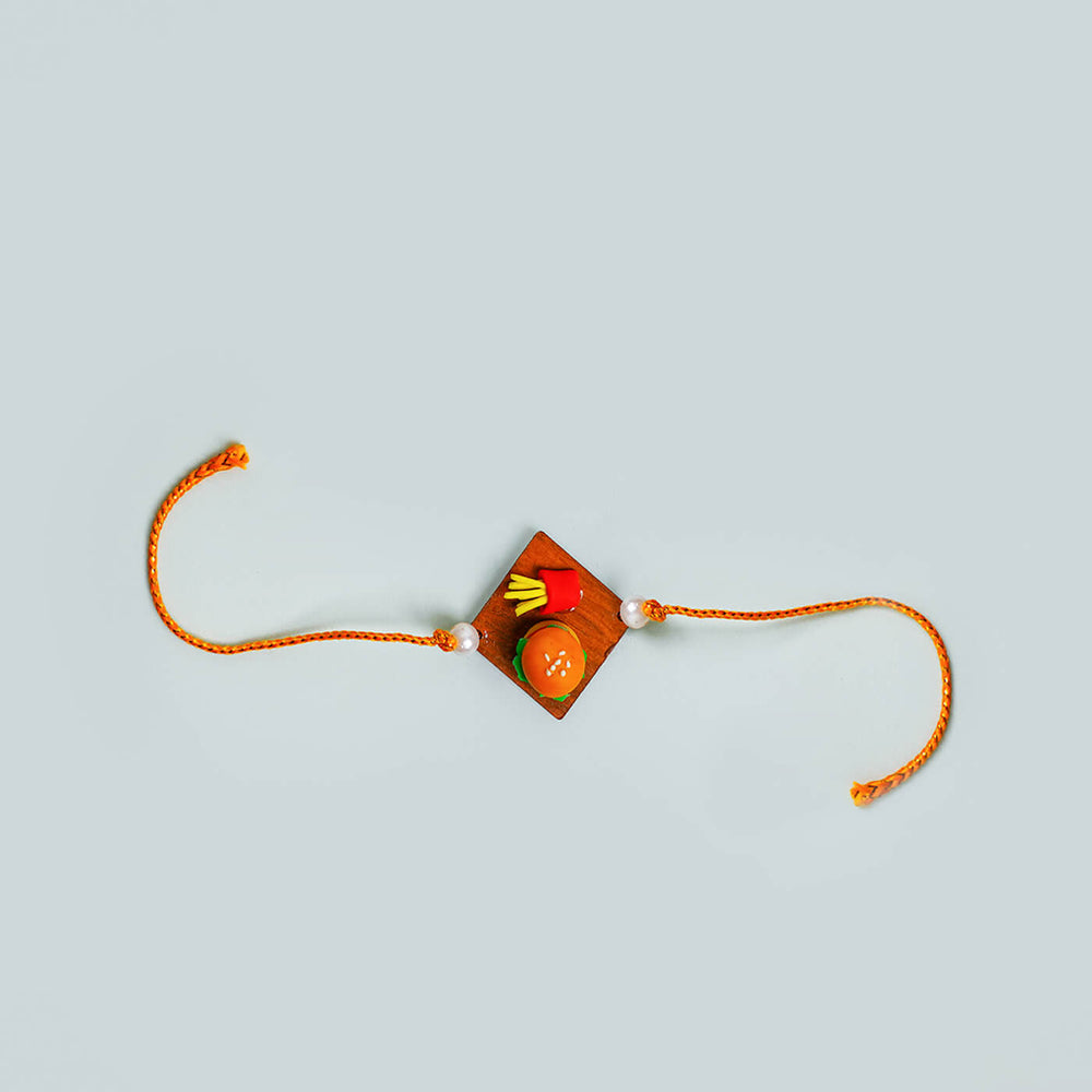 Handmade Food Themed Clay Rakhi 3 - Flat Lay of Hamburger Rakhi