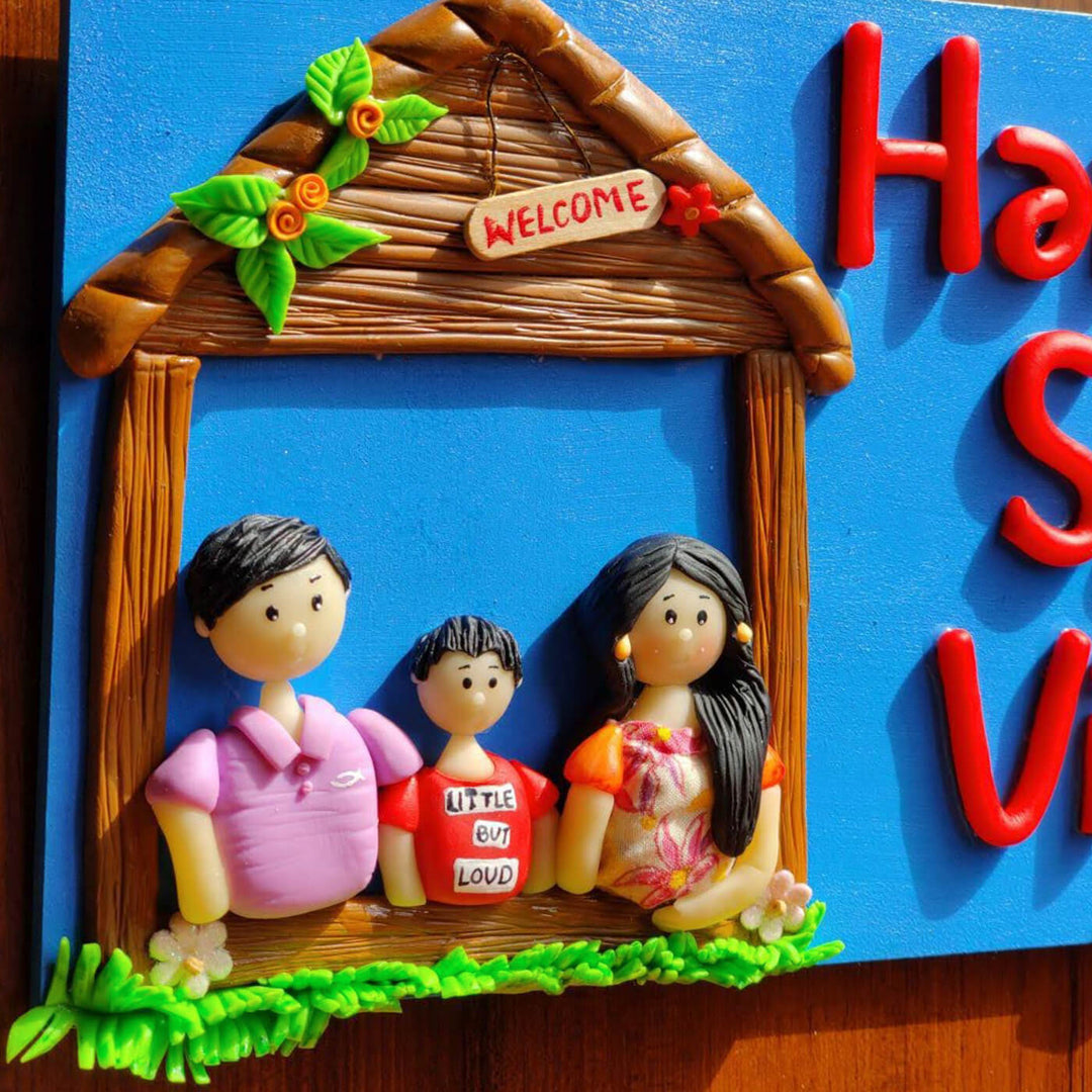 Handcrafted Personalized Clay Caricature Family Name Plate - Close-up of Personalized Family Figurines