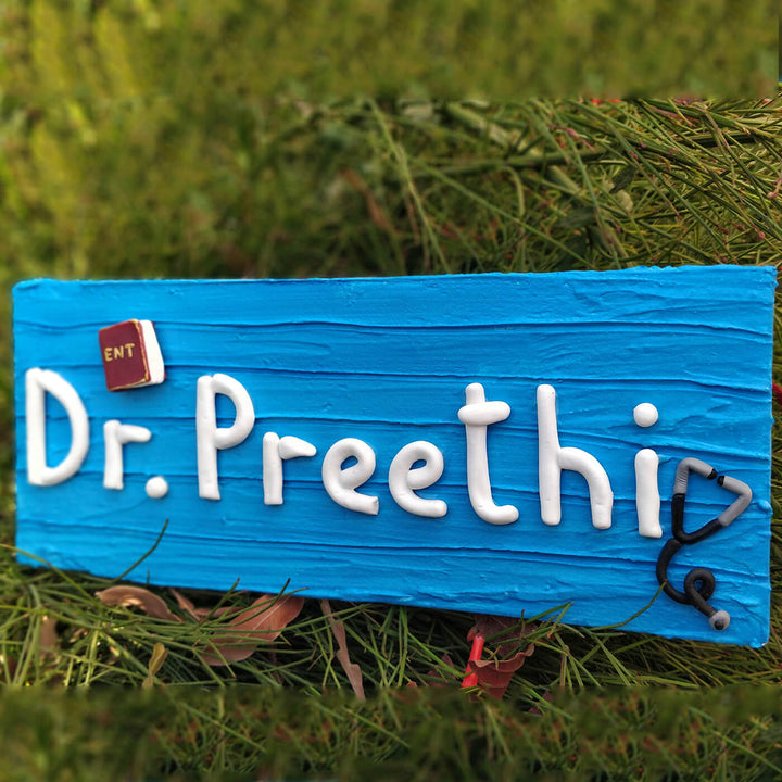 Handcrafted Personalized Desk Clay Name Plate For Doctors 1 - Front View on Grass Background