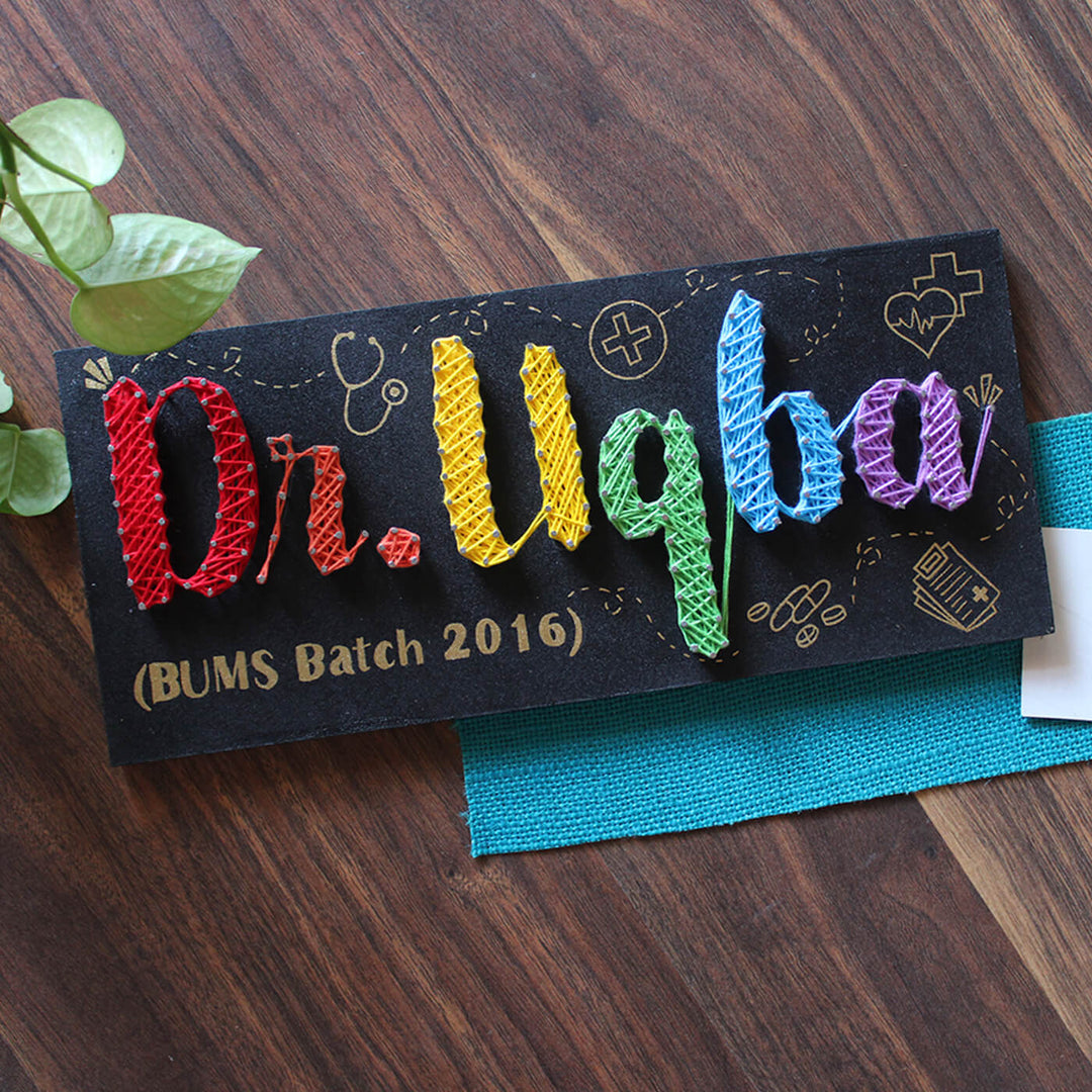 Handcrafted Personalized String Art Professional Name Plate With Qualifications - Oblique Angle with Background Details