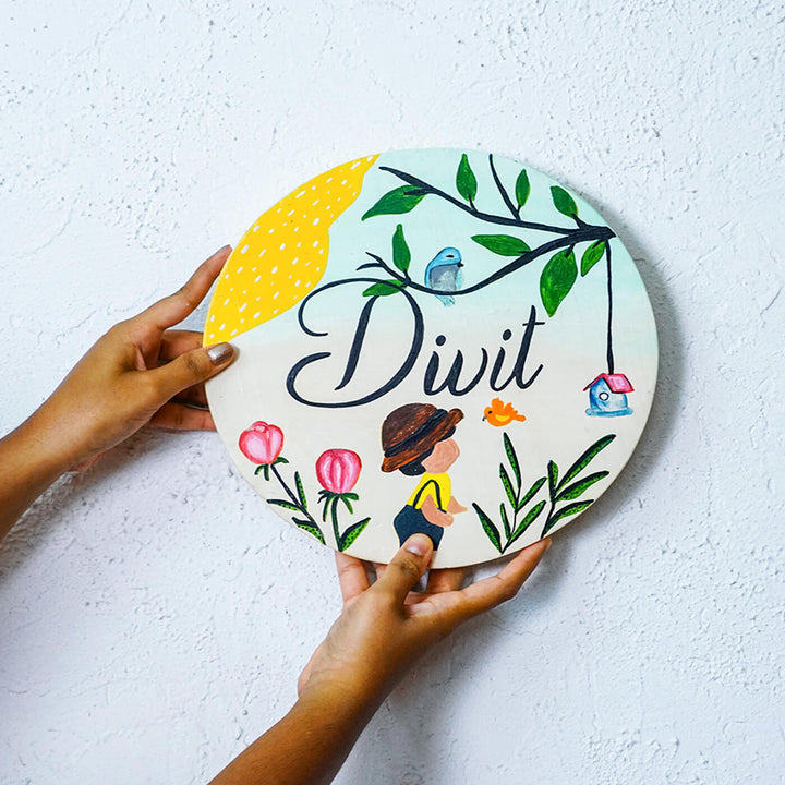 Handpainted Round Wooden Kids Name Plate - Held Front View Showing Personalization