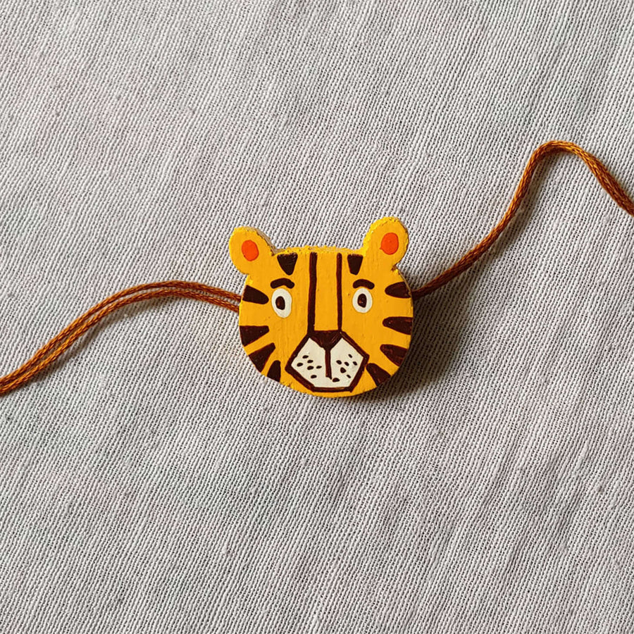 Handpainted Quirky Wooden Rakhi With Roli Chawal 1 - Front View with String