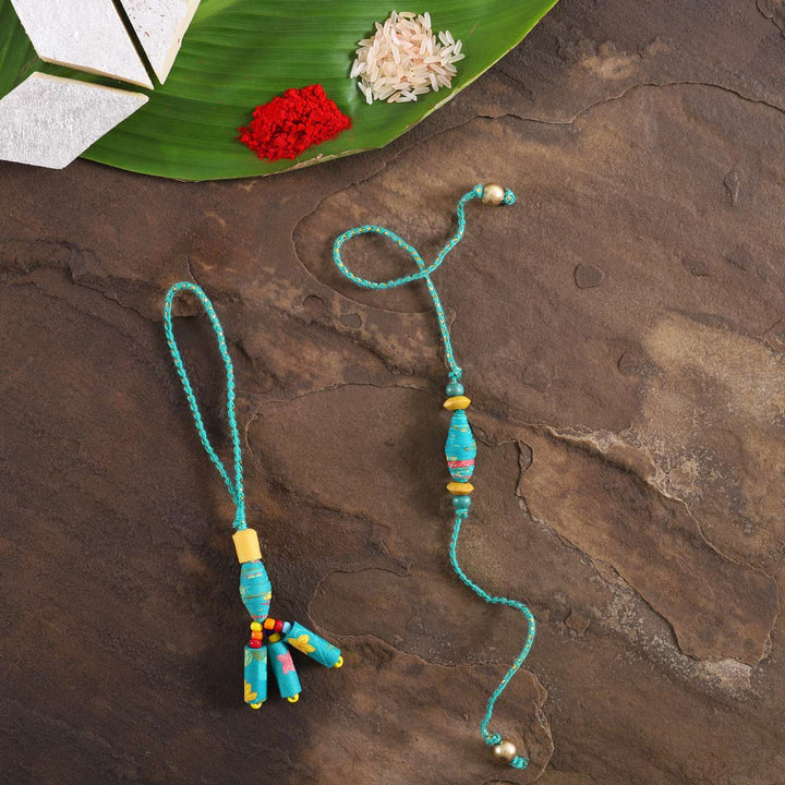 Handmade Beaded Paper Bead Bhaiya Bhabhi Rakhi With Roli Chawal Set Of 2 - Top View Showing Both Items