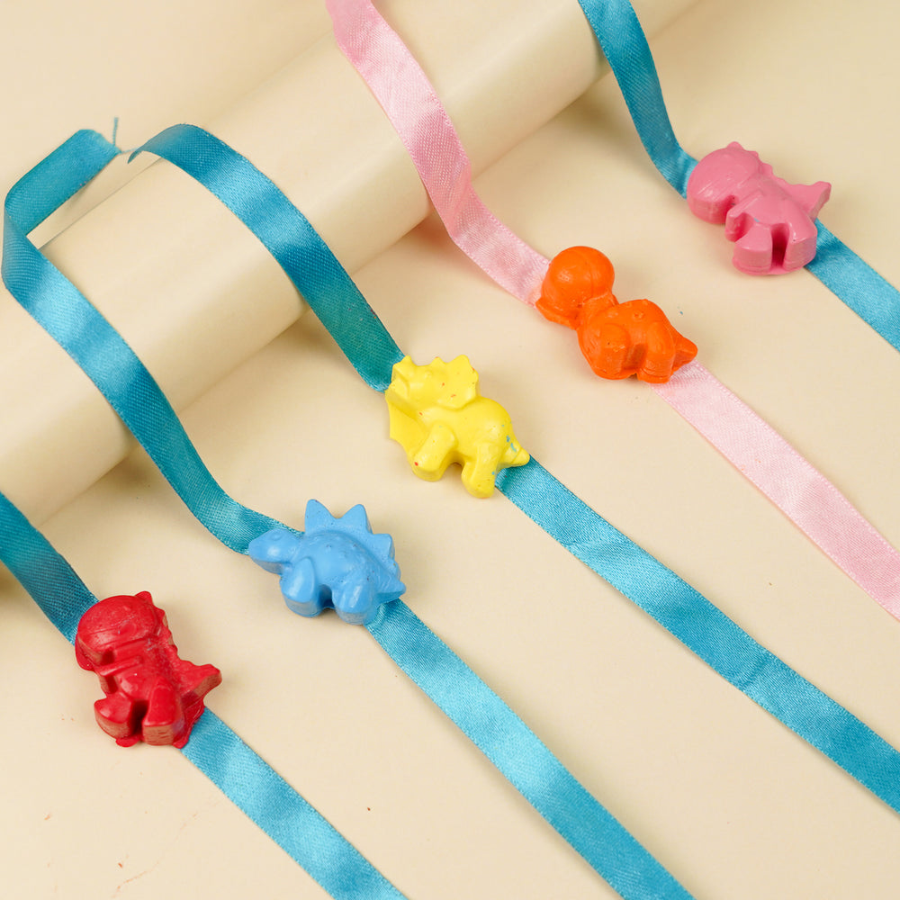 Reusable Non Toxic Multicolour Dino Theme Wax Kids Rakhi Set Of 5 - Rolled Surface Display of Dino Bracelets
