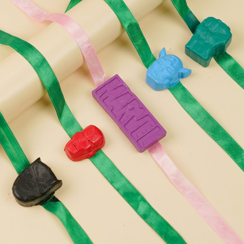 Reusable Non Toxic Avengers Theme Wax Kids Rakhi Set Of 5 - Angled View on Display Surface