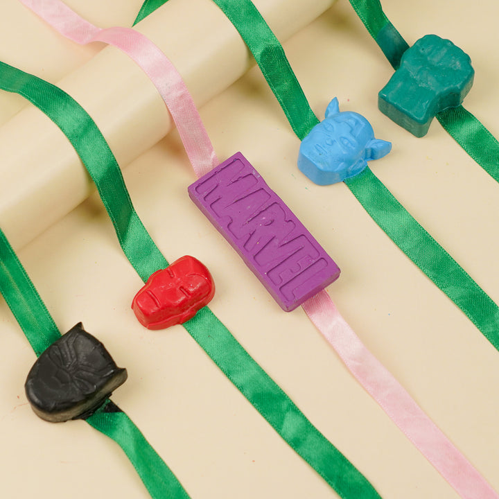 Reusable Non Toxic Avengers Theme Wax Kids Rakhi Set Of 5 - Angled View on Display Surface
