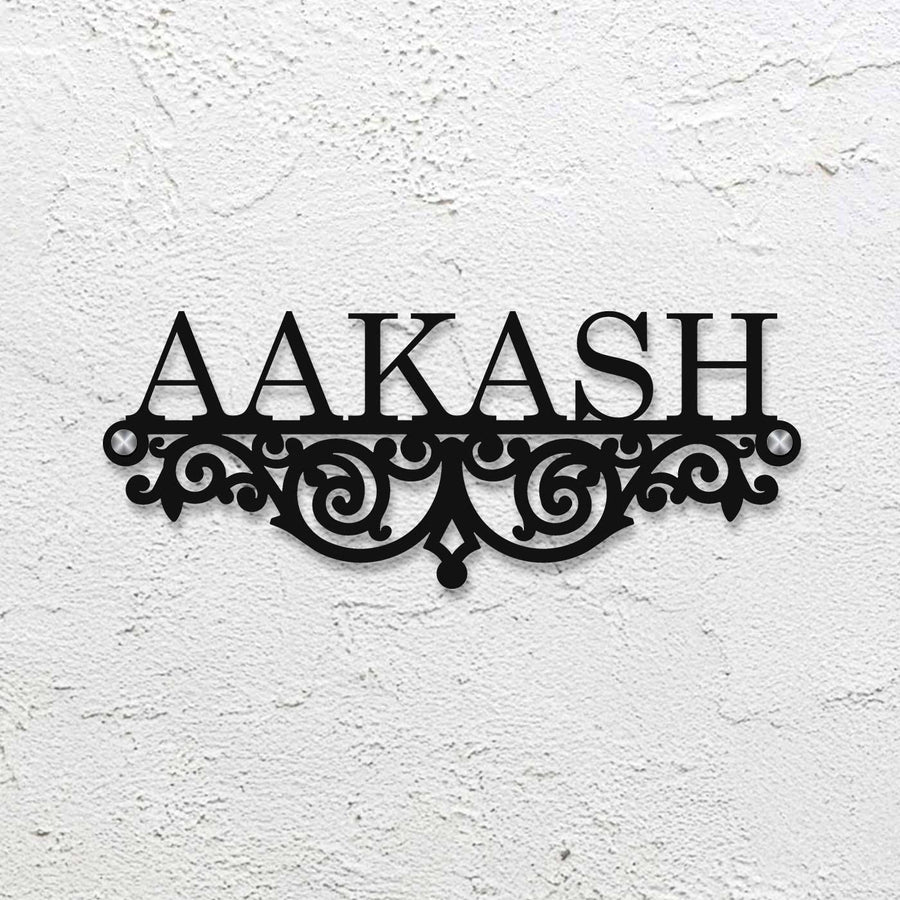 Personalized Laser Cut Minimalist Design Steel Name Plate - Mounted on White Textured Wall