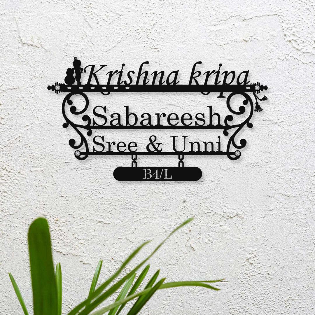Personalized Laser Cut Little Krishna Theme Steel Name Plate - Mounted on White Wall Close-up