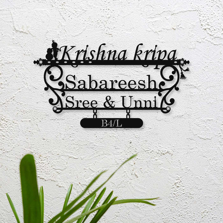 Personalized Laser Cut Little Krishna Theme Steel Name Plate - Mounted on White Wall Close-up