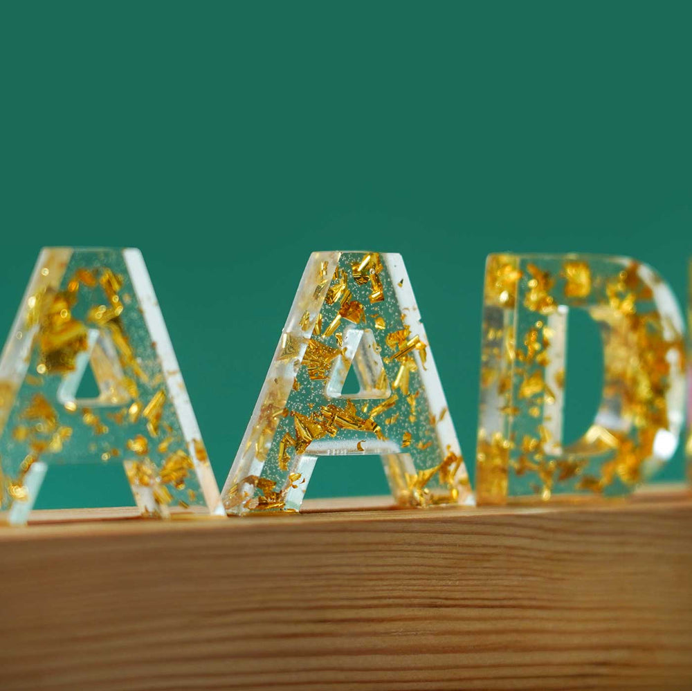 Handmade Resin White Gold Tabletop Name Plate With Led Lights - Side View Showing Transparency and Details