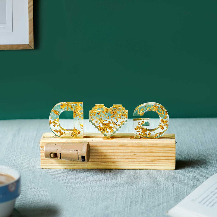 Handmade Resin White Gold Tabletop Name Plate With Couple Initials Led Lights - Front View on Wooden Base (5)