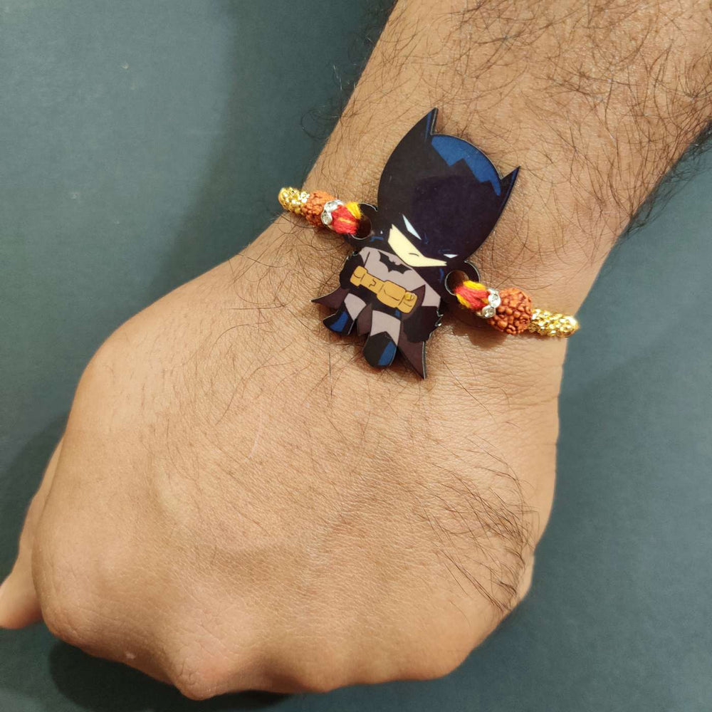 Handmade Printed Batman Wooden Rudraksha Rakhi With Roli Chawal - Model Wearing Bracelet Close-up