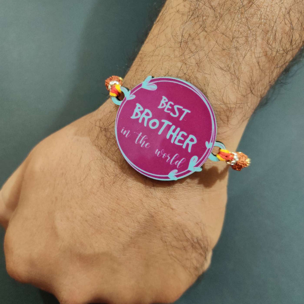 Handmade Printed Best Brother In World Wooden Rudraksha Rakhi With Roli Chawal - Worn on Wrist Close-up