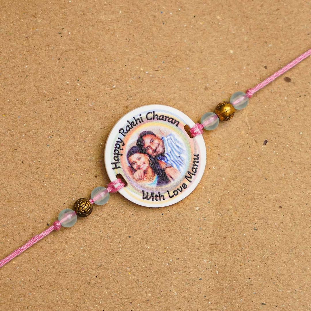 Photo Personalized Handmade Rainbow Acrylic Rakhi With Roli Chawal - Close-up of personalized rakhi