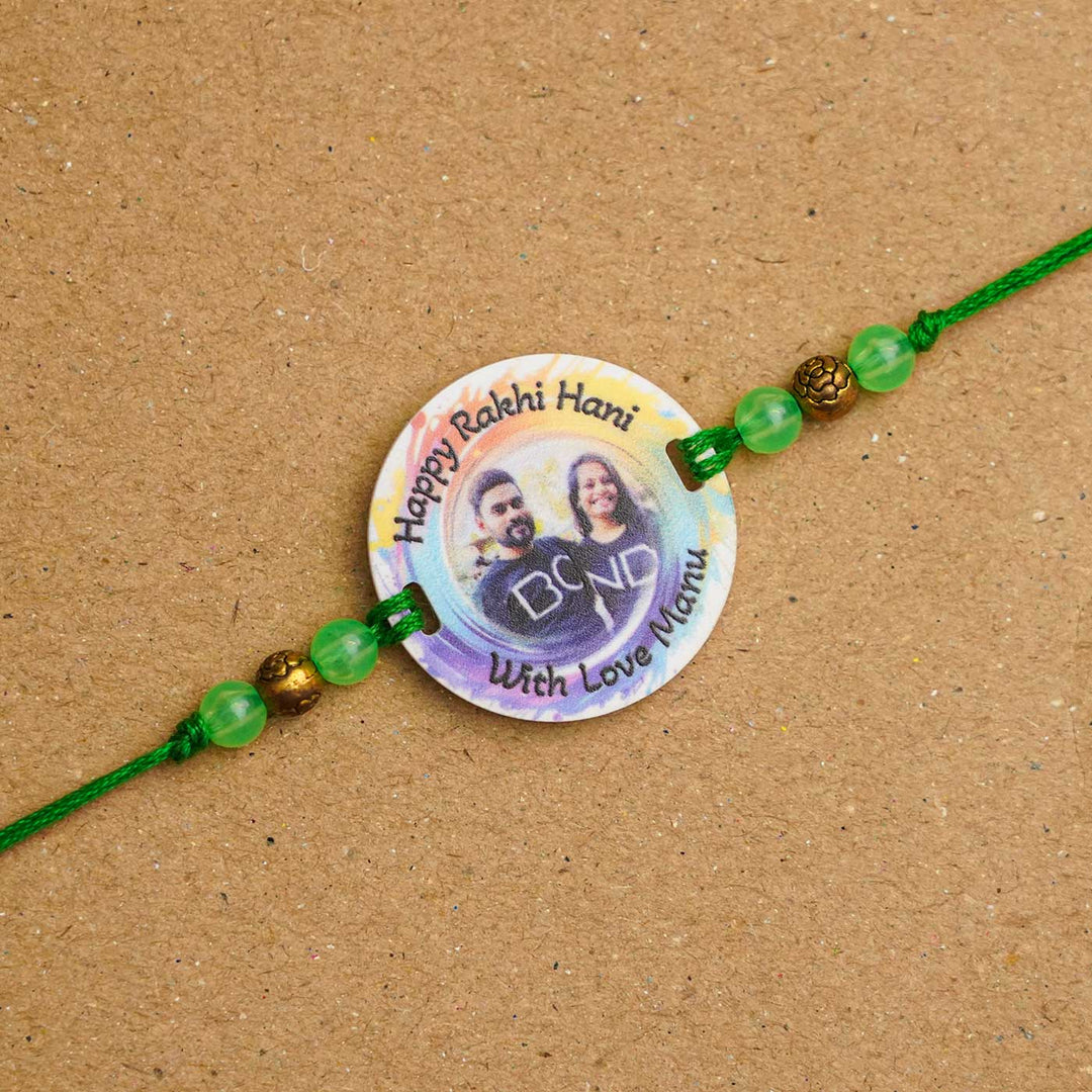 Photo Personalized Handmade Rainbow Acrylic Rakhi With Roli Chawal - Close-up of third personalized rakhi