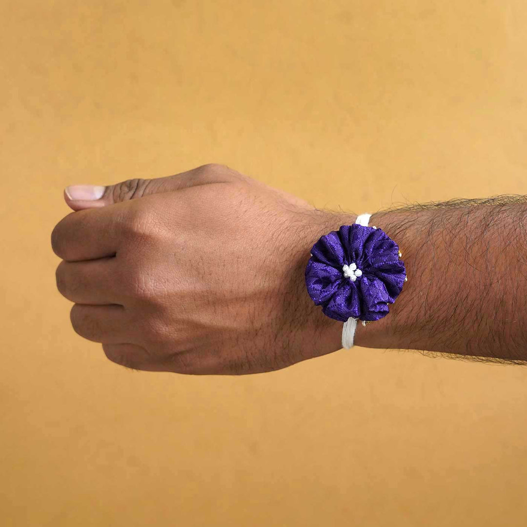 Handmade Purple Floral Fabric Rakhi With Roli Chawal - Band worn on wrist