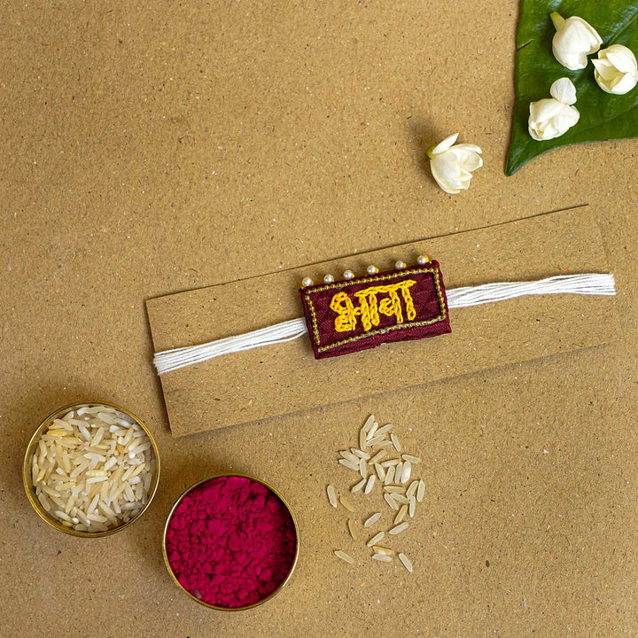 Handmade Bhava Fabric And Mdf Rakhi With Roli Chawal - Packaged with Rakhi Essentials