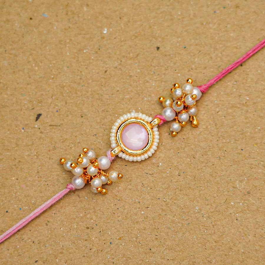 Reusable Resin Kundan Rakhi With Roli Chawal For Brother - Close-up of single rakhi