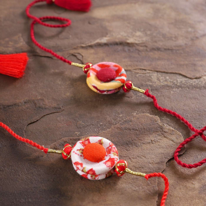 Handmade Ring Cotton Rakhi With Roli Chawal Set Of 2 - Close-up on Decorative Centerpieces