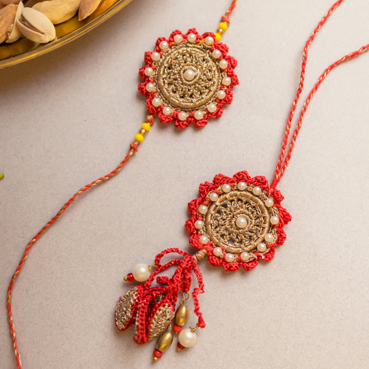 Intricate Crochet Festive Red Bhaiya Bhabhi Pearl Rakhi-Lumba Set With Roli Chawal | Set of 2