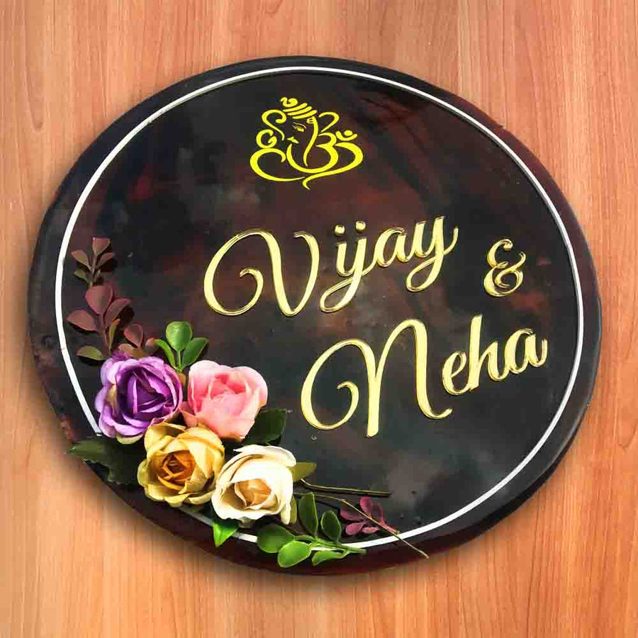 Personalized Handmade Flowers And Ganesha Wooden Name Plate With 3D Letters - Top-Down View with Floral Decoration