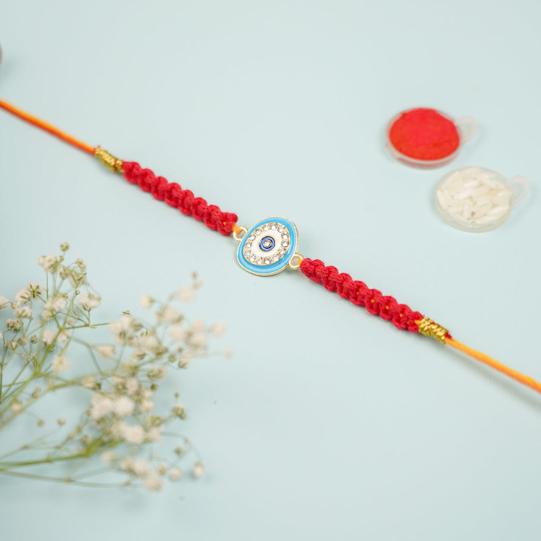 Customized Handmade Macrame Evil Eye Metal Rakhi With Roli Chawal - Flat lay with accessory items (8)